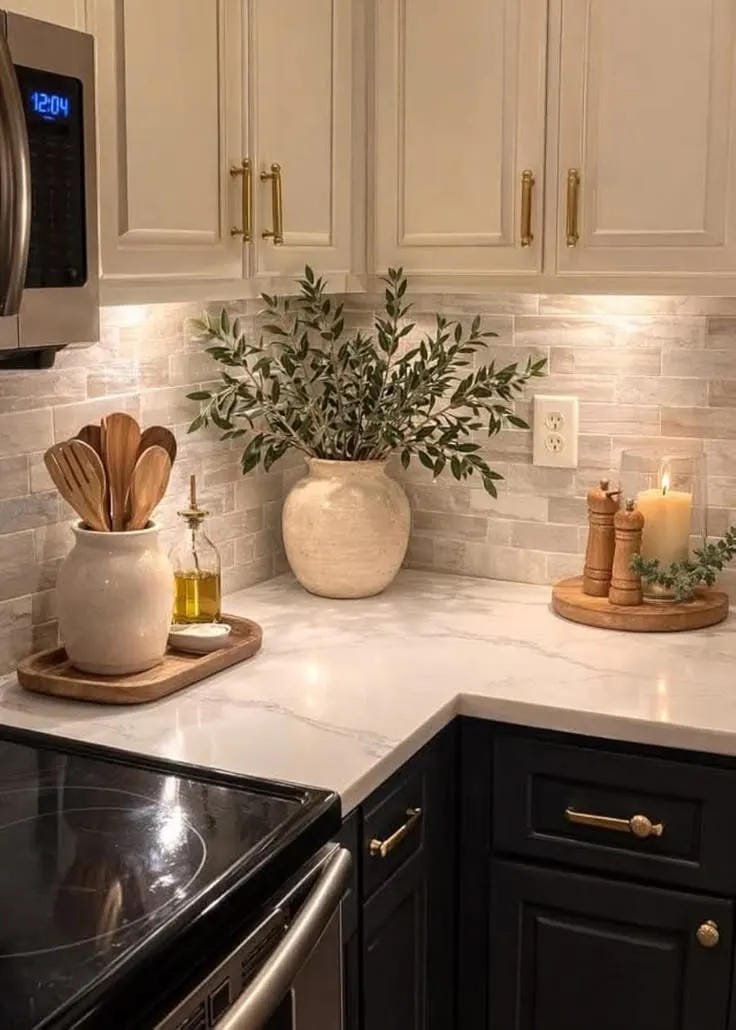 kitchen counter decor ideas with vase wood spoons tray oil and candle by stove