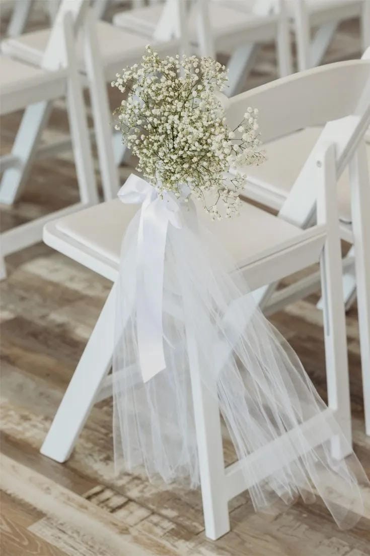 wedding ceremony aisle inspiration with flowers and candles