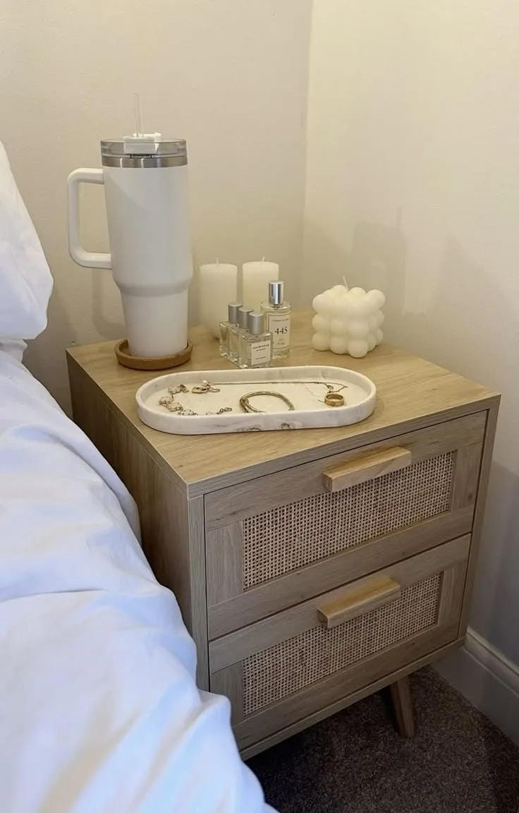 nightstand organization ideas with tray water bottle candle jewelry dish and lamp