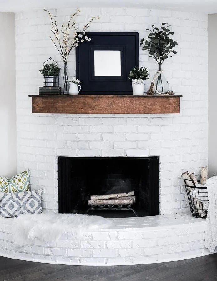 summer mantel decor ideas with use black accents on white brick