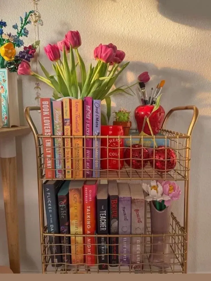 dorm desk ideas with a rolling book cart flowers and desk supplies