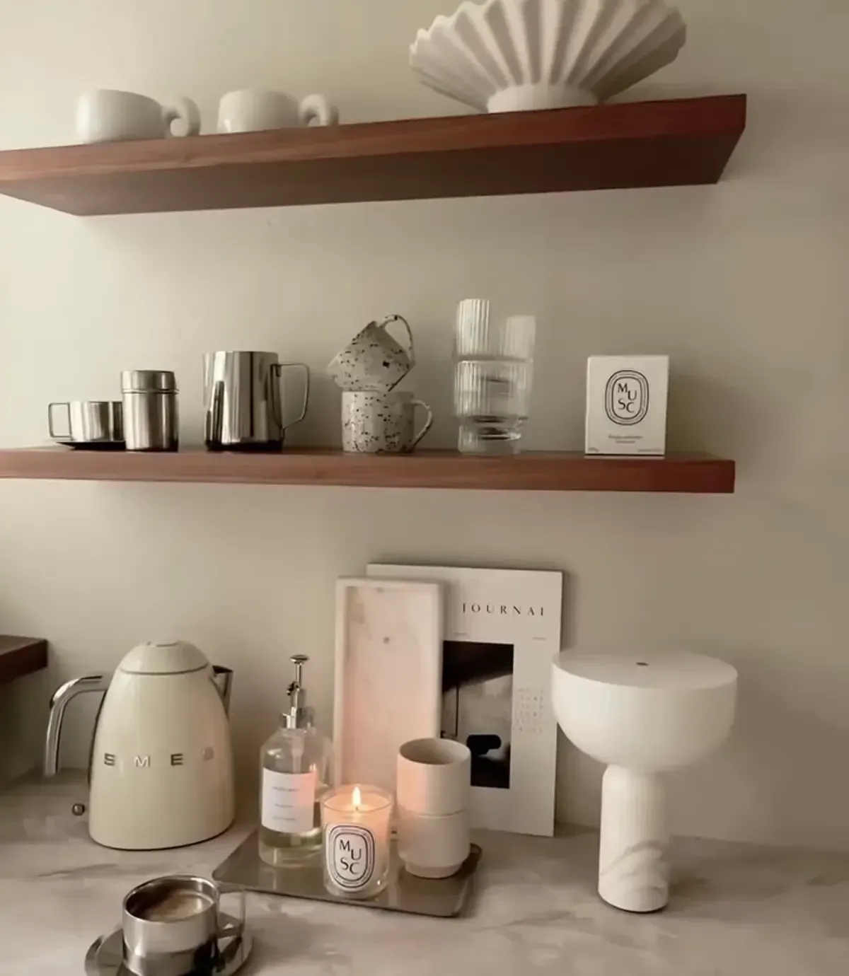 farmhouse coffee station ideas with floating shelves, white canisters, mugs, and warm wood