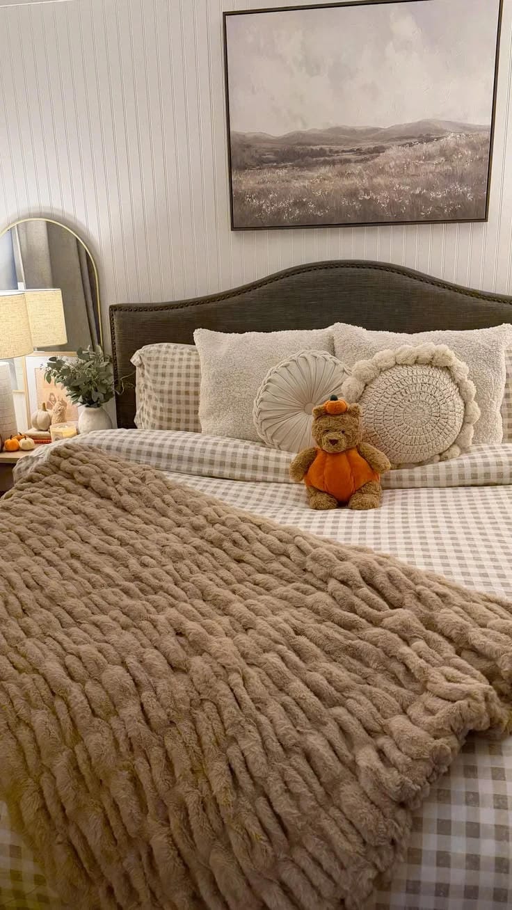 fall bedding idea with layered bedding and bedroom decor