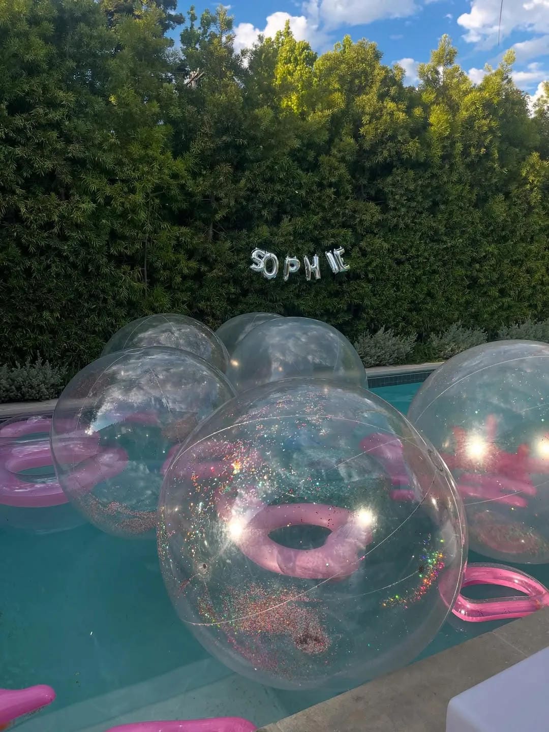 pool party decor ideas with float clear bubble tubes