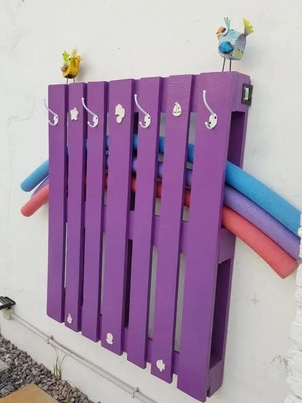outdoor towel station idea for a backyard pool