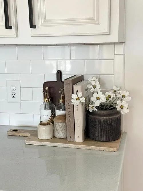 kitchen counter decor ideas with small shelf cookbooks black vase and white flowers