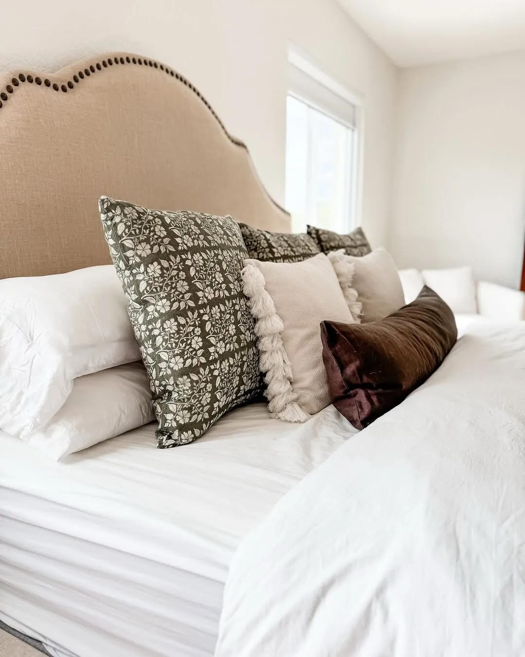 summer bedroom decor ideas with add contrast with patterned pillows