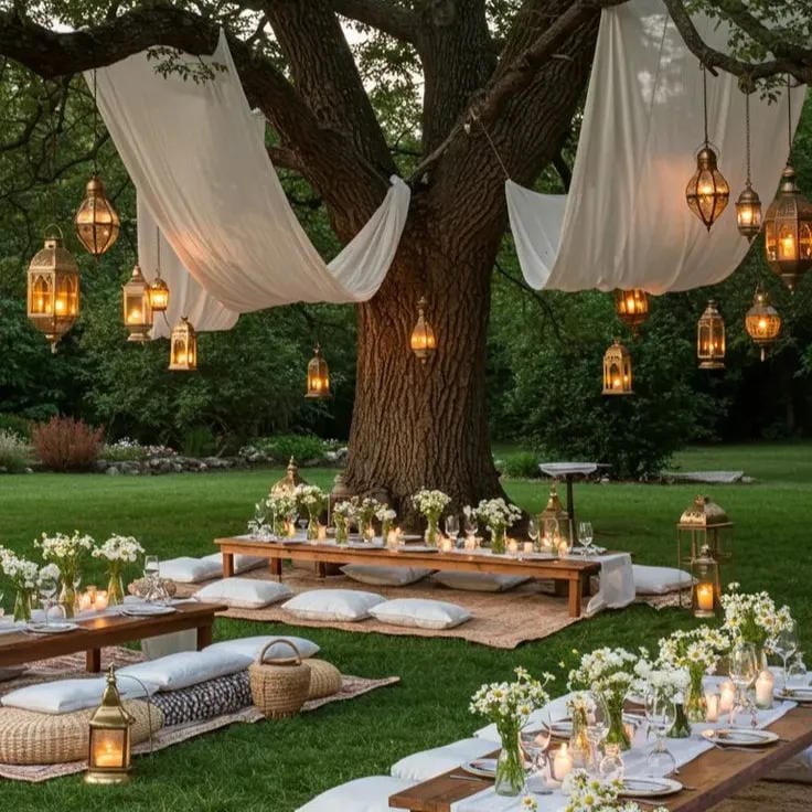 backyard party aesthetic ideas with drape fabric from a tree