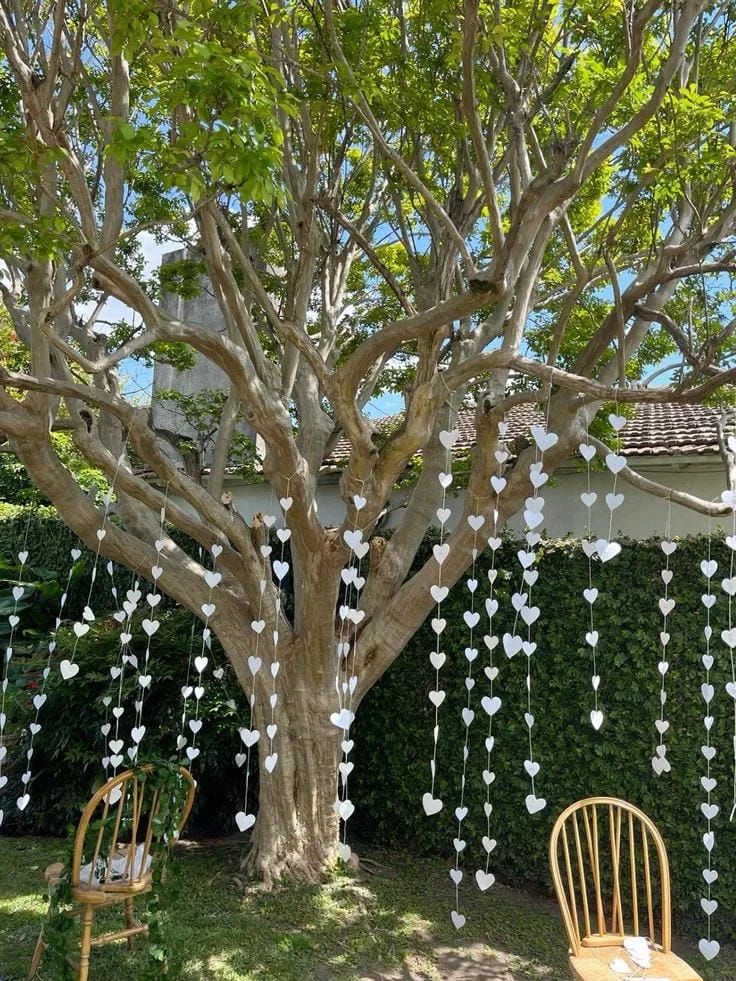 backyard wedding reception under string lights with romantic table decor