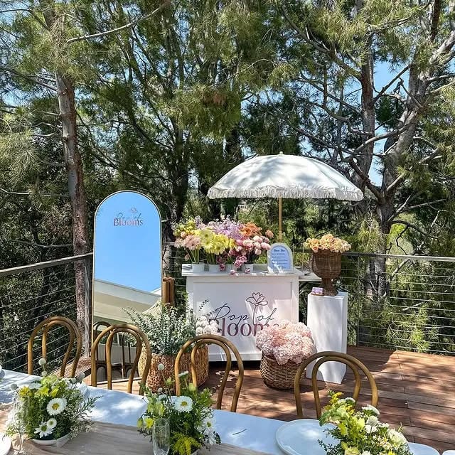 garden bridal shower flower station with pastel blooms