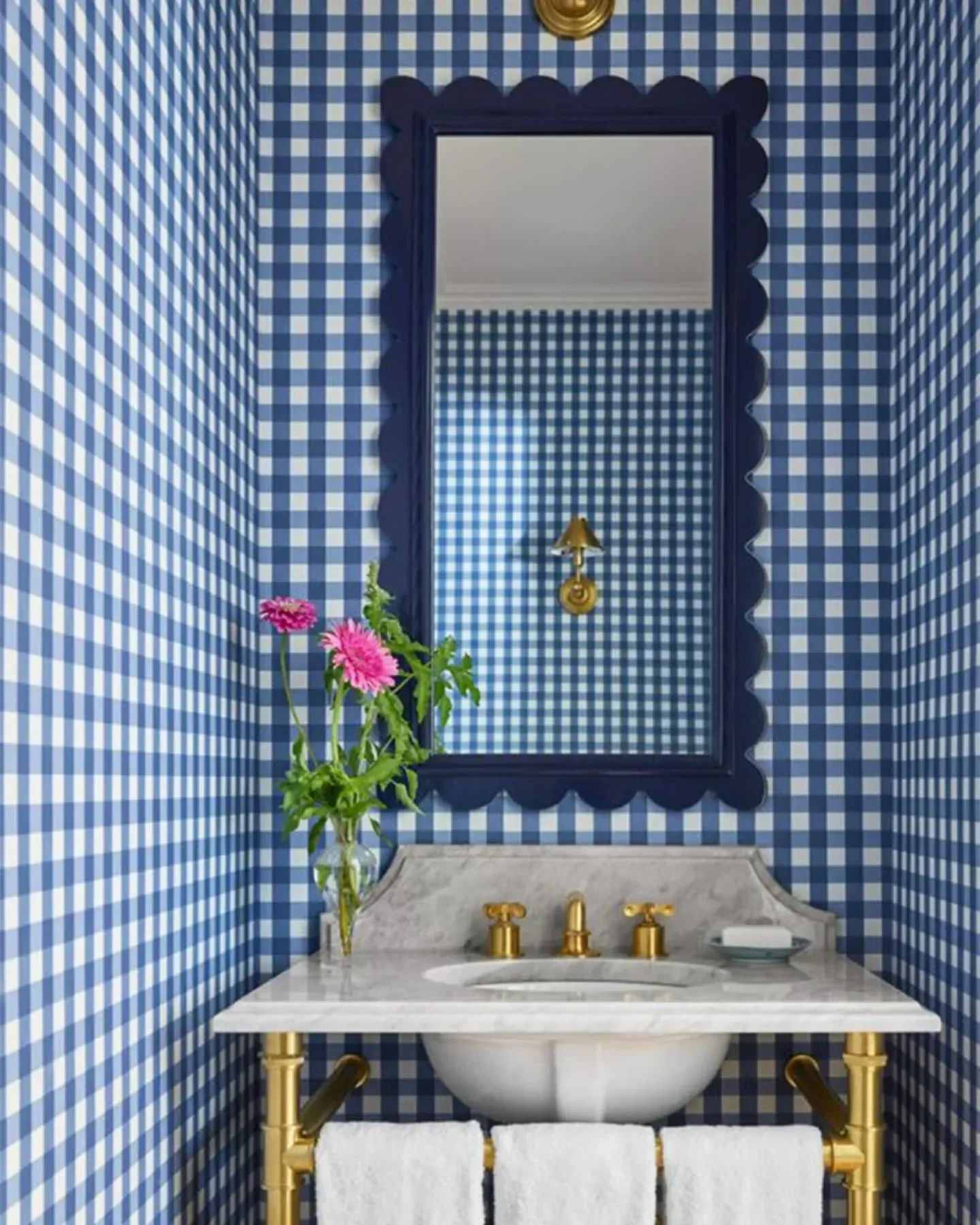 creative bathroom ideas with blue gingham wallpaper navy mirror and pink flowers