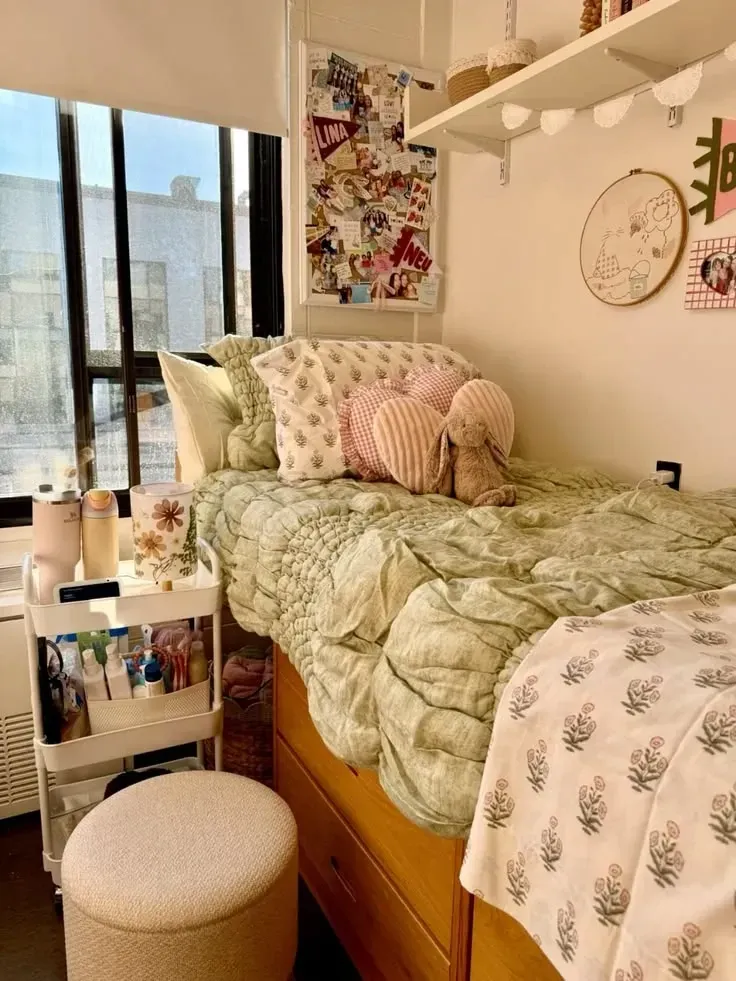pink and green dorm room ideas with green floral bedding pink pillows and a lofted bed