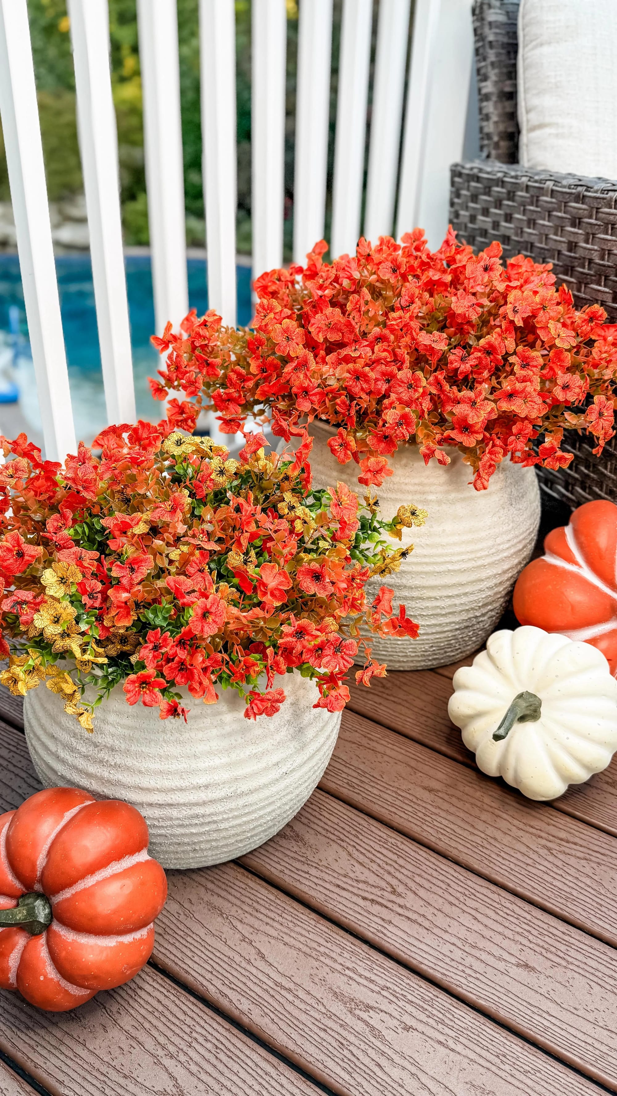 fall flower arrangement ideas with orange mums pumpkins and white outdoor planters