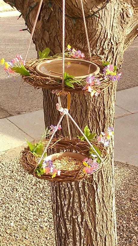 DIY bird bath idea with hanging basket and small saucer water bowls