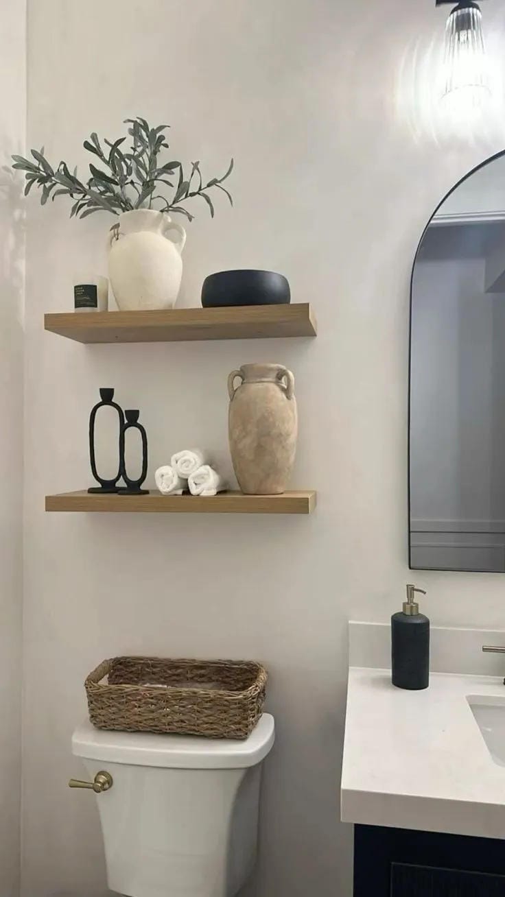 bathroom shelf decor ideas with wood shelves vase candles basket and small sculptural accents