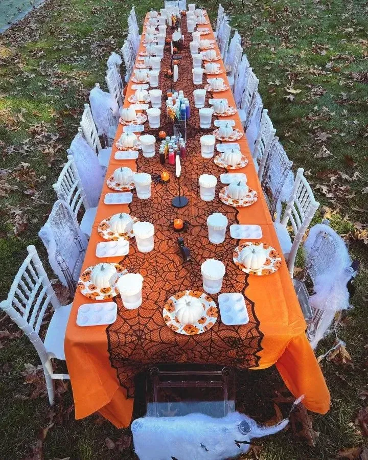 painting pumpkins backyard halloween party ideas