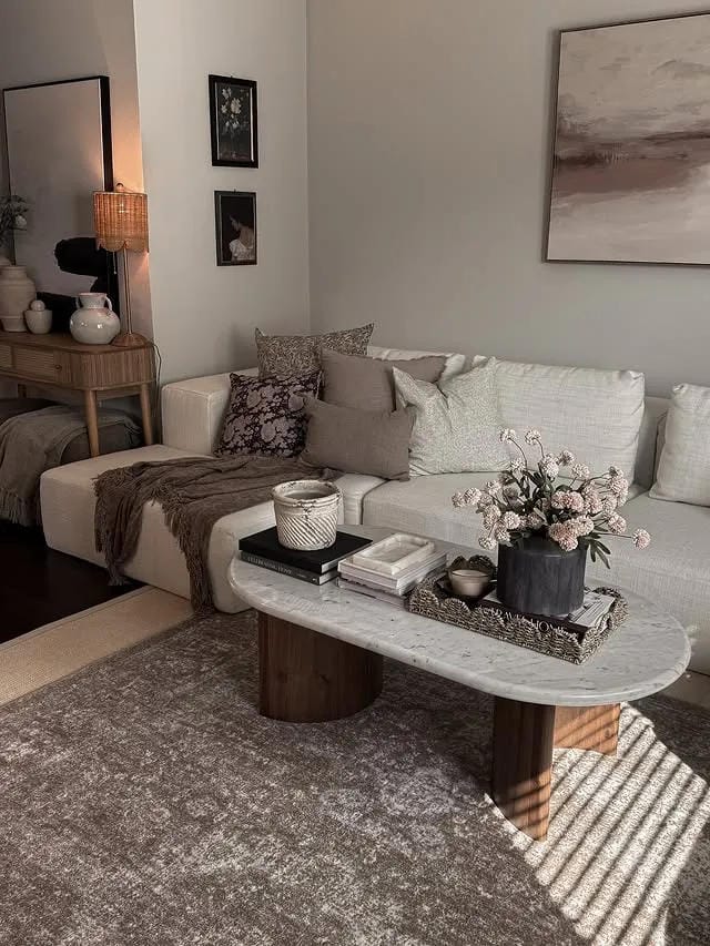 coffee table decor ideas with marble coffee table black vase flowers books candle and cozy neutral decor