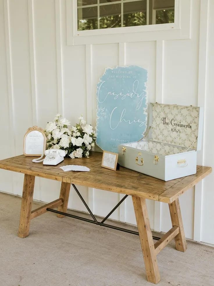 simple wedding welcome table idea for a reception entrance
