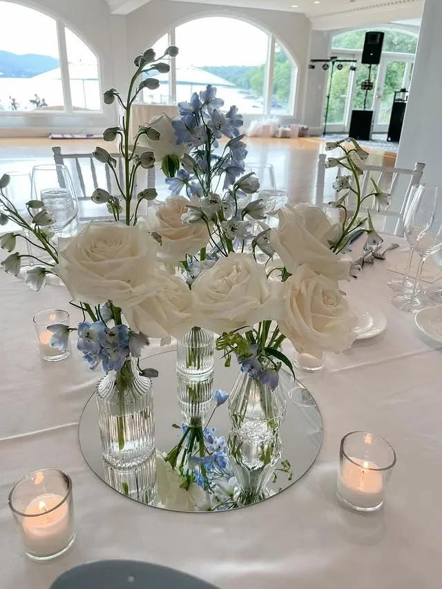 wedding reception table decor with greenery runner