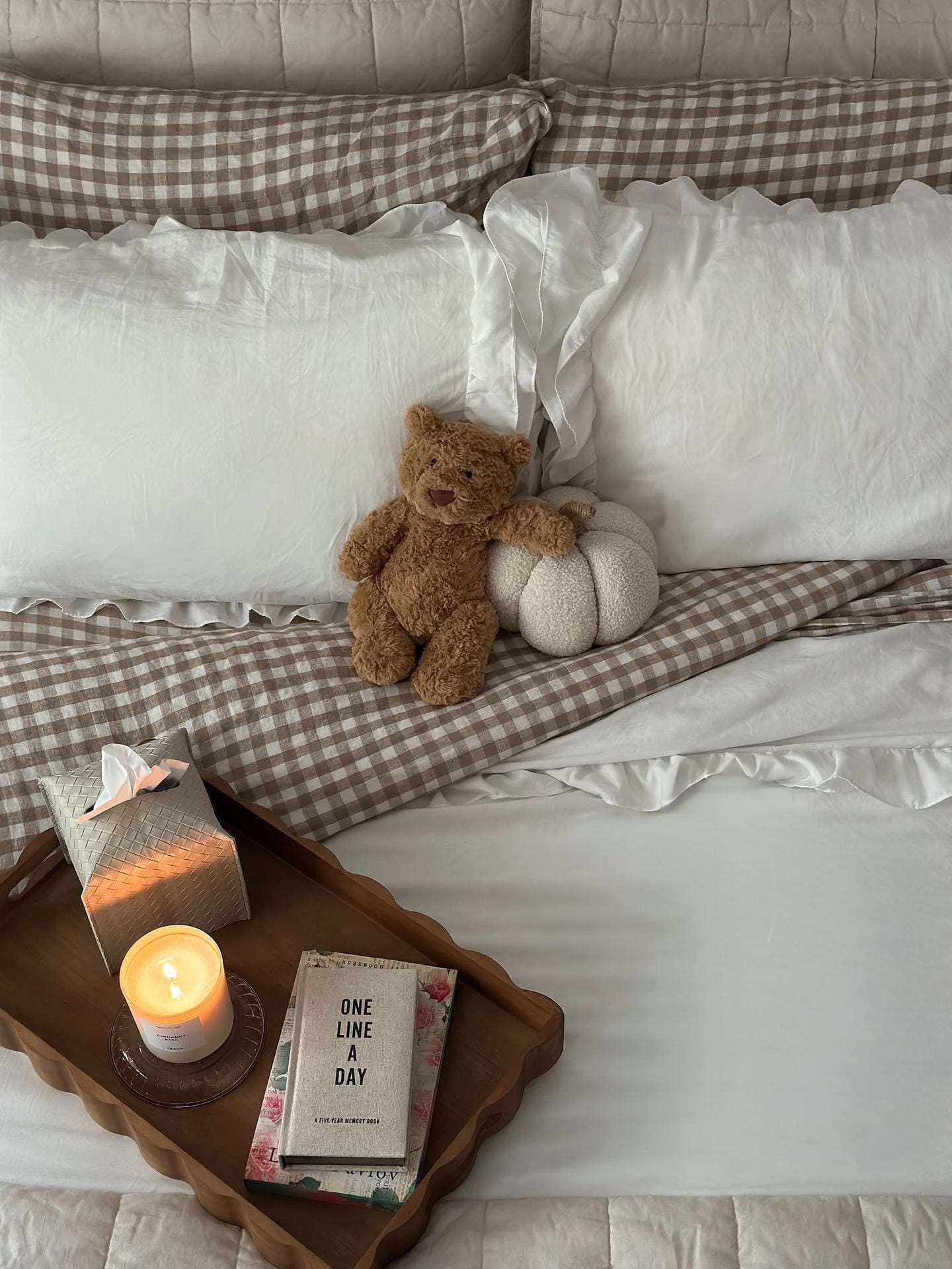 fall bedding idea with layered bedding and bedroom decor