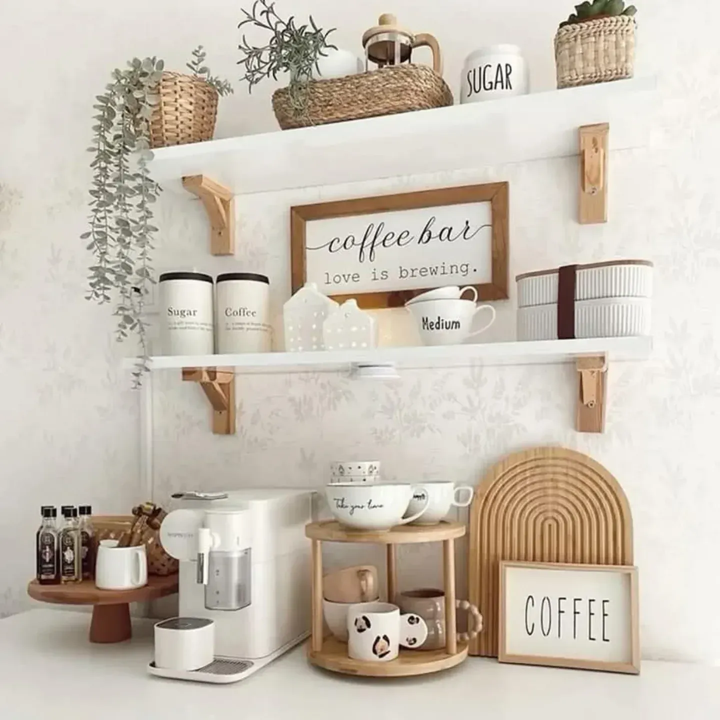 cozy coffee station ideas with shelves, white mugs, canisters, and coffee sign