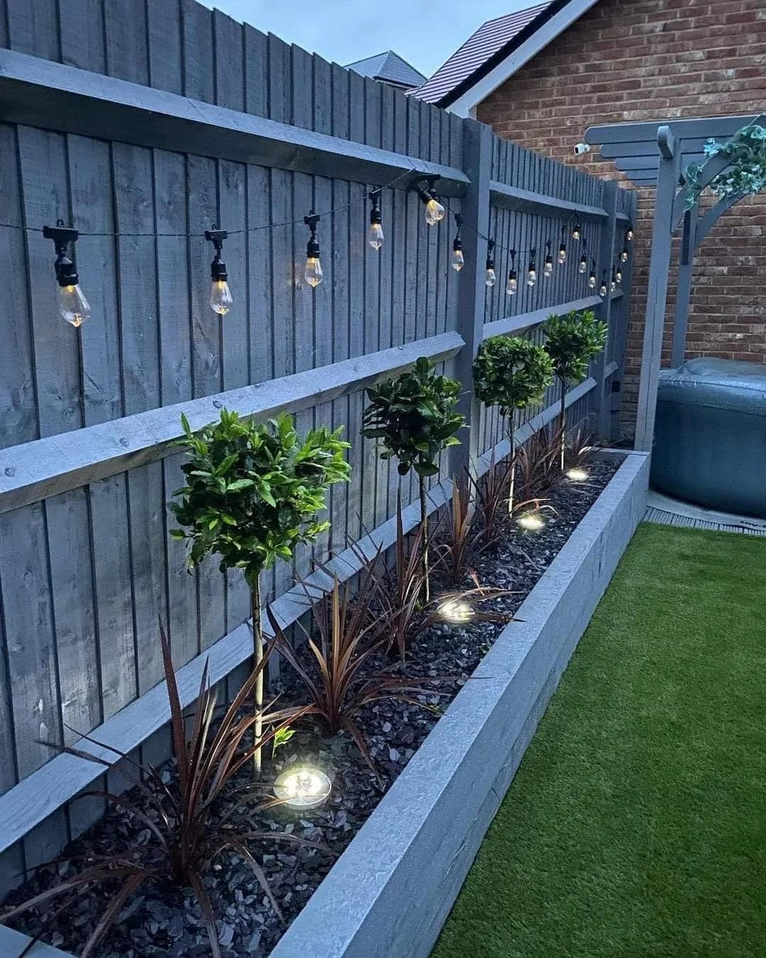 outdoor string light ideas with add lights along a fence garden