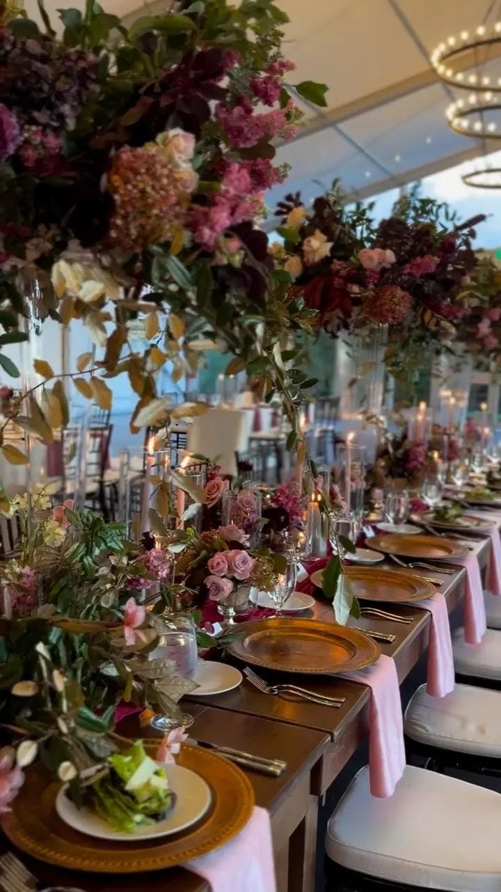 fall flower arrangement ideas with hanging flowers above a long dinner table