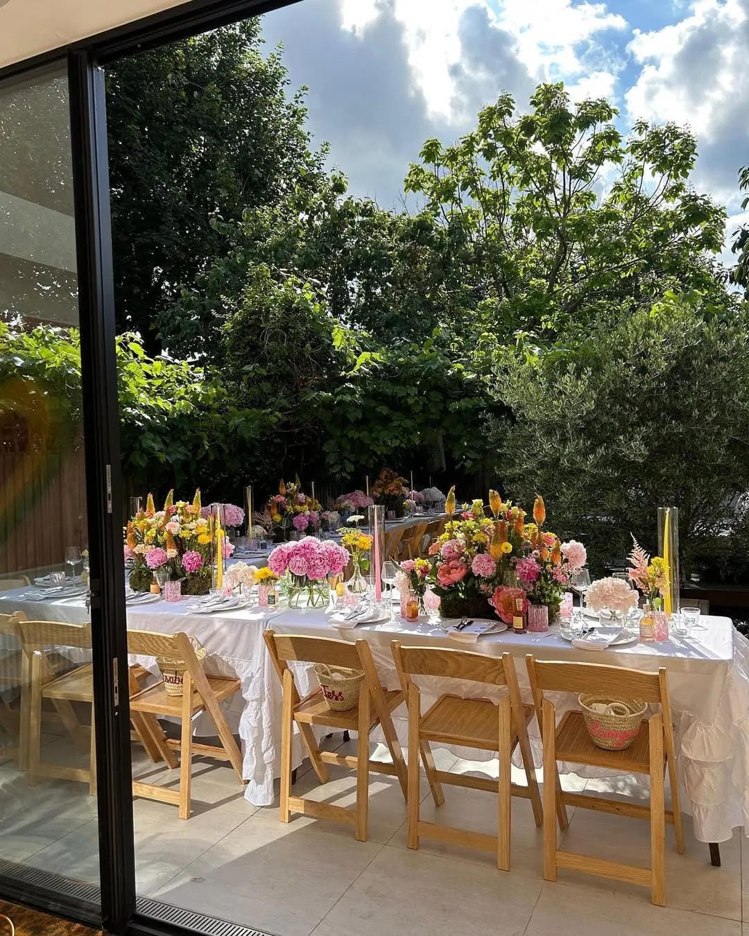 backyard party aesthetic ideas with host dinner on the patio