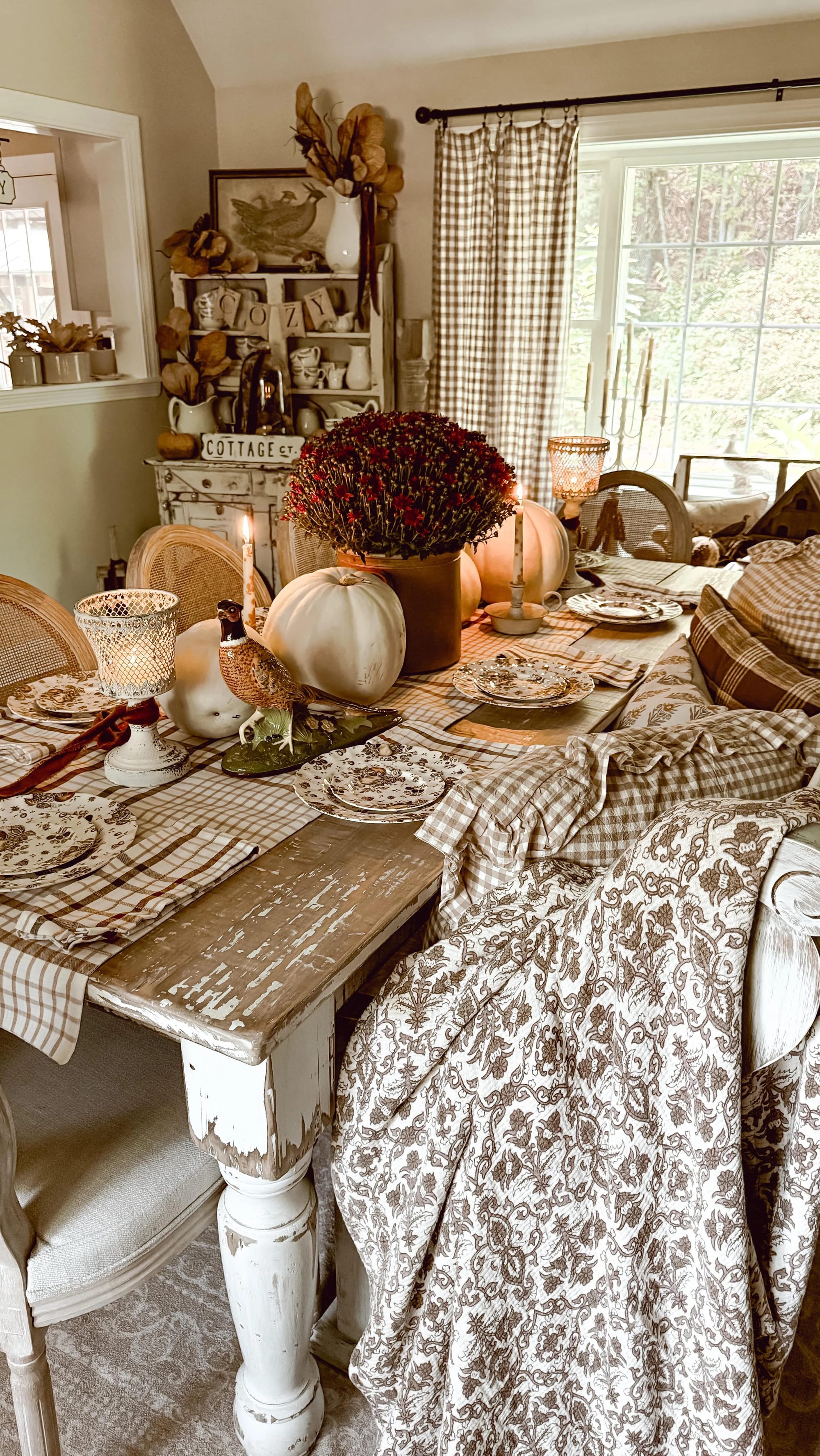 fall tablescape ideas with a patterned runner white pumpkin woven textures and layered plates