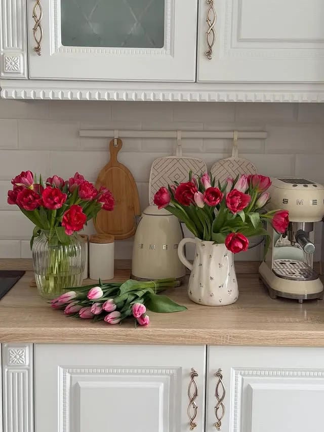 kitchen counter decor ideas with pink tulips coffee maker pitcher and cutting boards