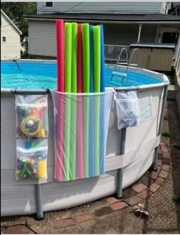 outdoor pool towel storage idea for a tidy patio