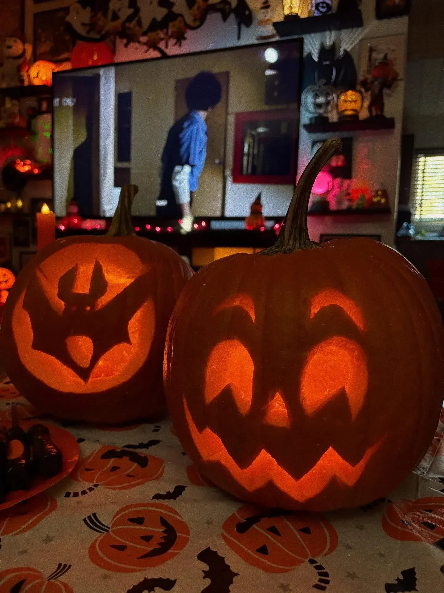 kid friendly pumpkin carving ideas with simple pumpkin for Halloween movie night setup