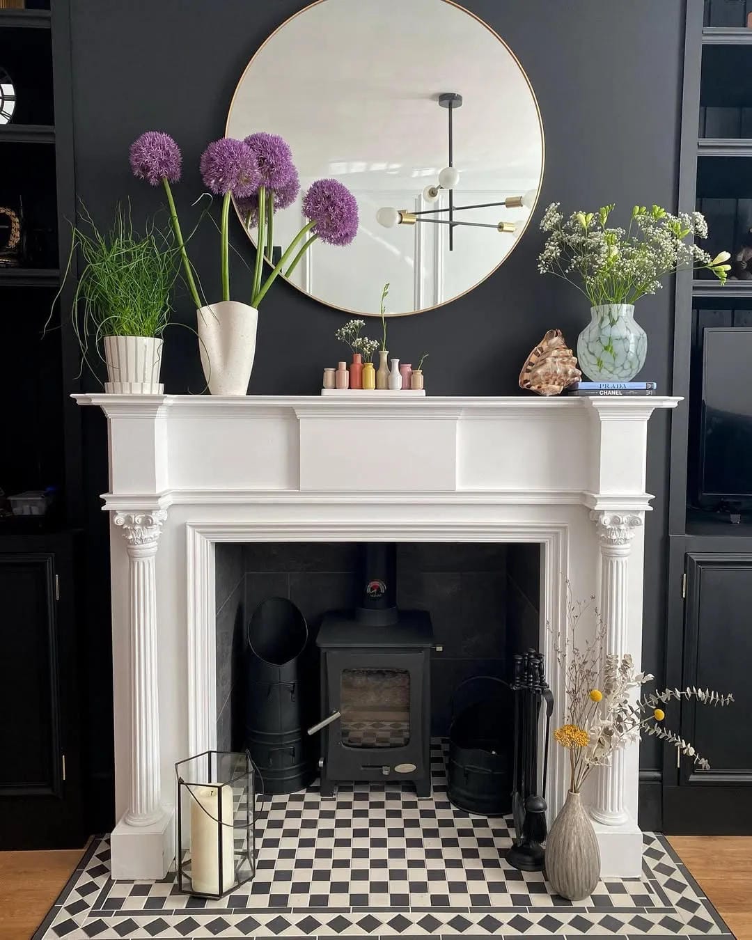 summer mantel decor ideas with add purple flowers beside a round mirror