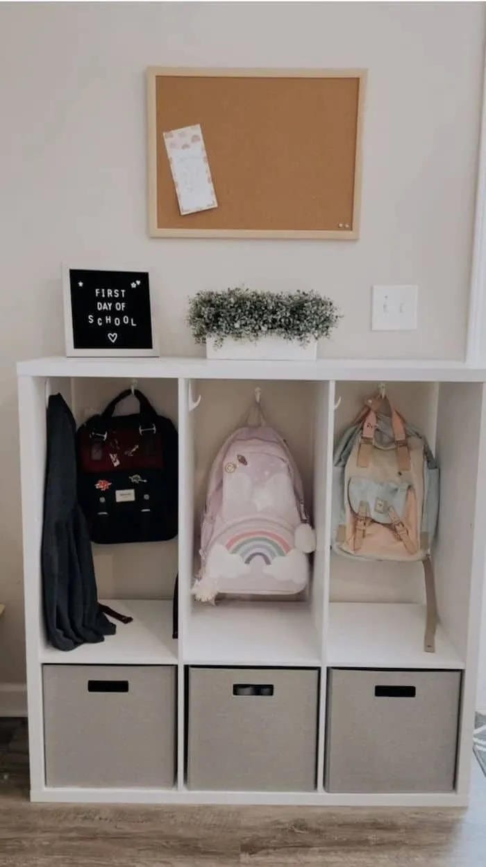 entryway school organization idea with kids backpacks