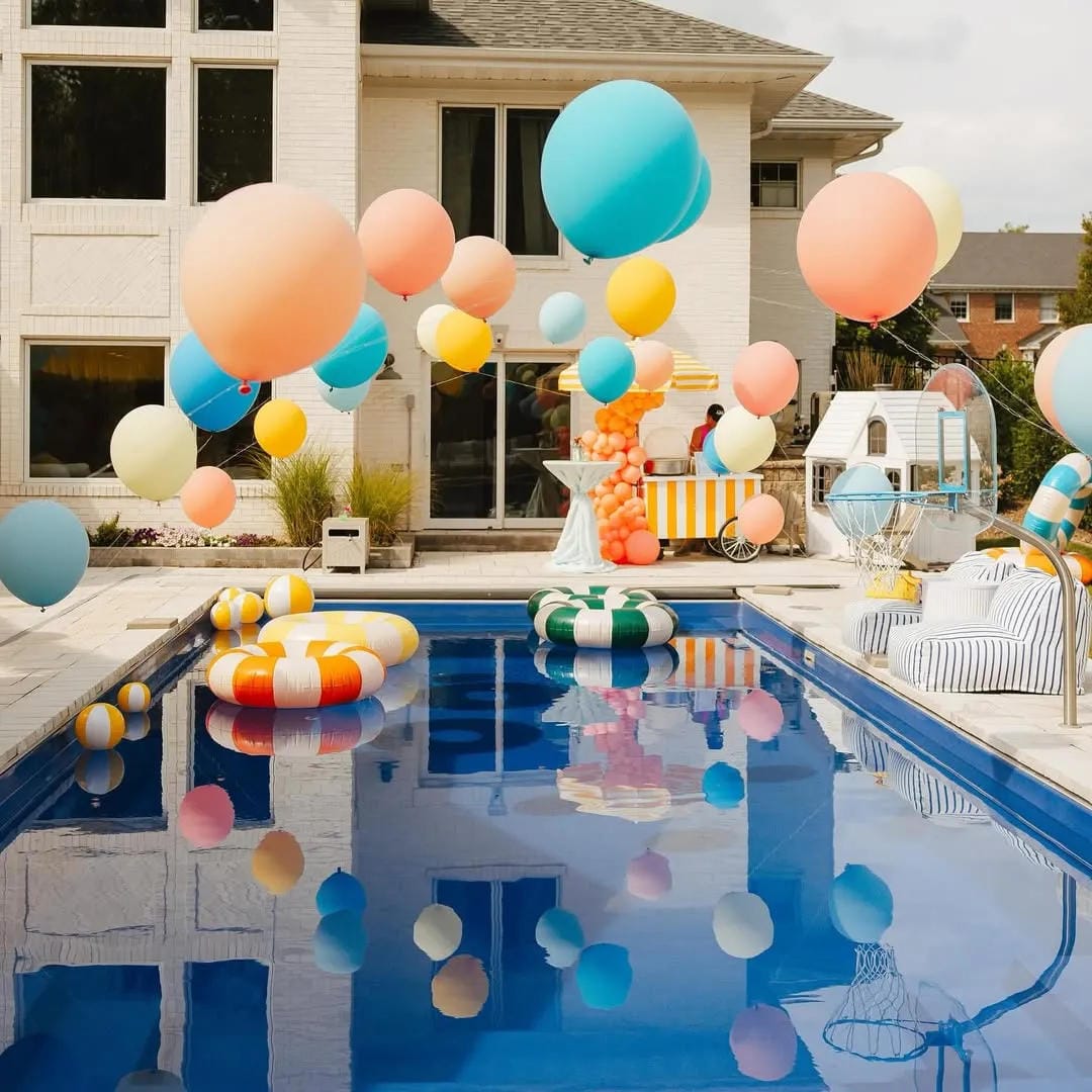pool party decor ideas with choose pastel balloons for a softer party