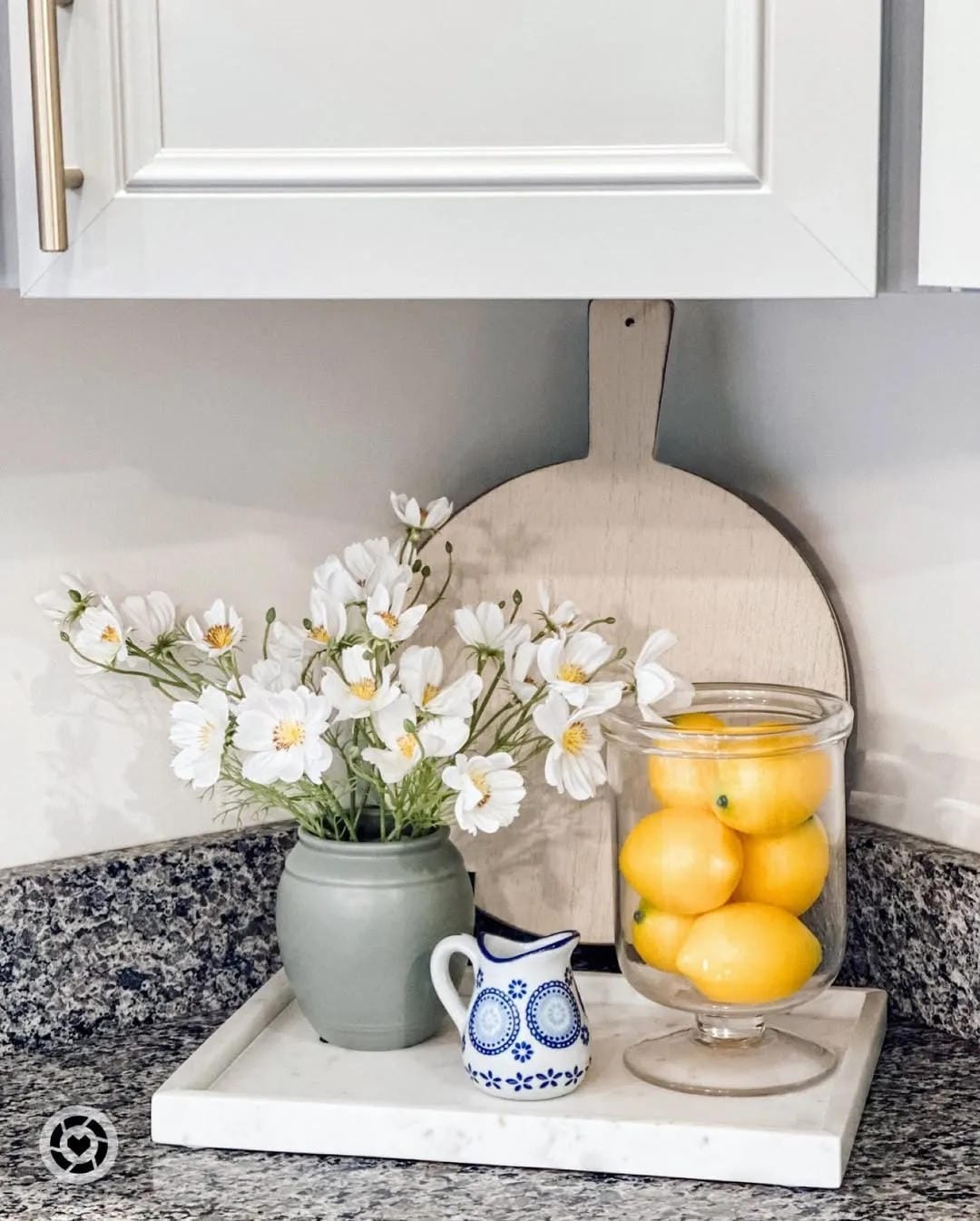 summer kitchen decor ideas with pair lemons with white flowers