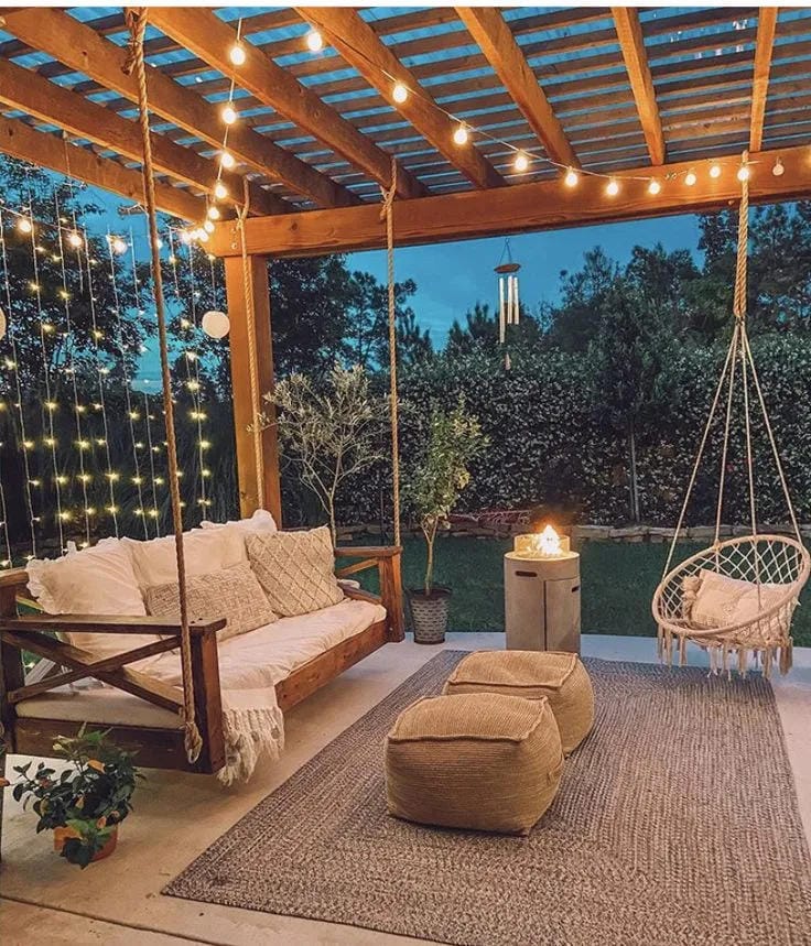 covered porch ideas with swing sofa string lights poufs and outdoor rug