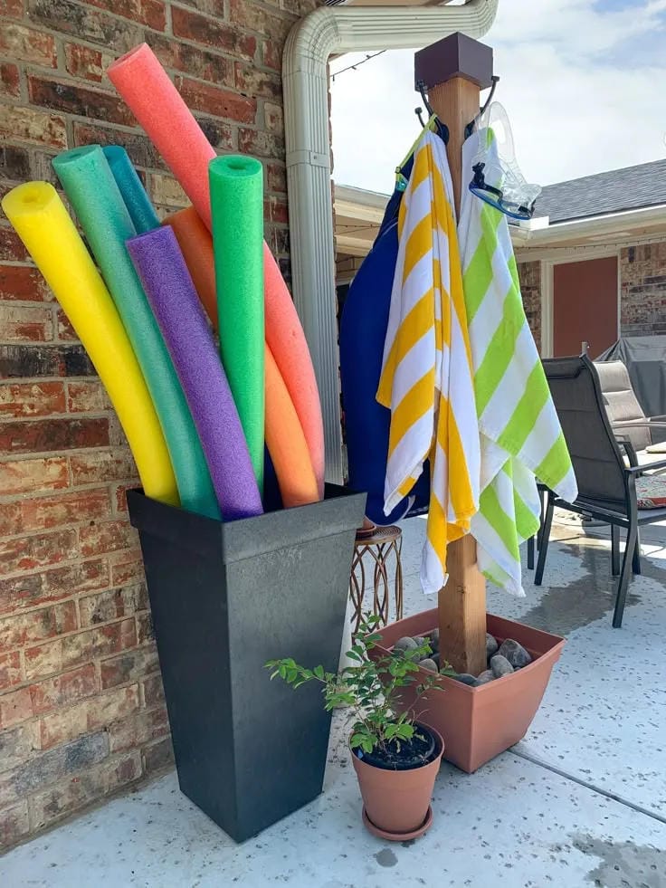 pool toy storage idea for a neat backyard setup