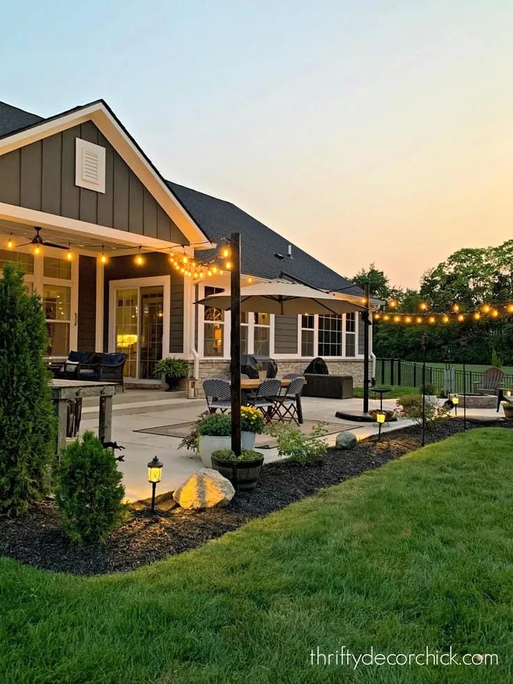 outdoor string light ideas with run lights from the house to the yard