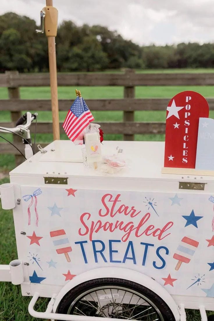 4th of July outdoor decorations with red white and blue setup