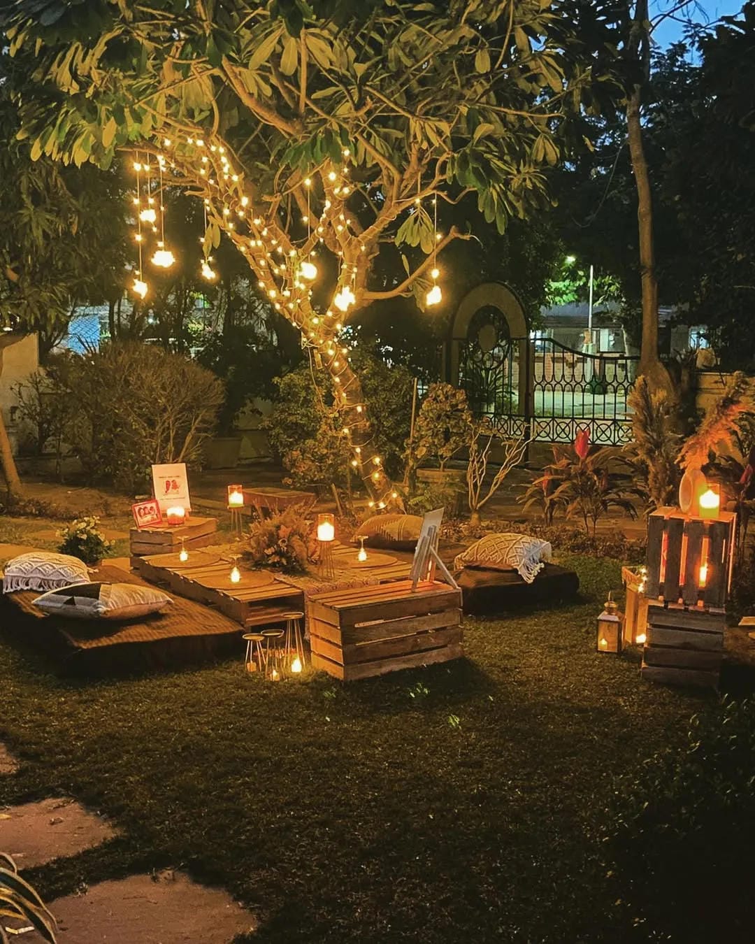 backyard party aesthetic ideas with light up a picnic under a tree