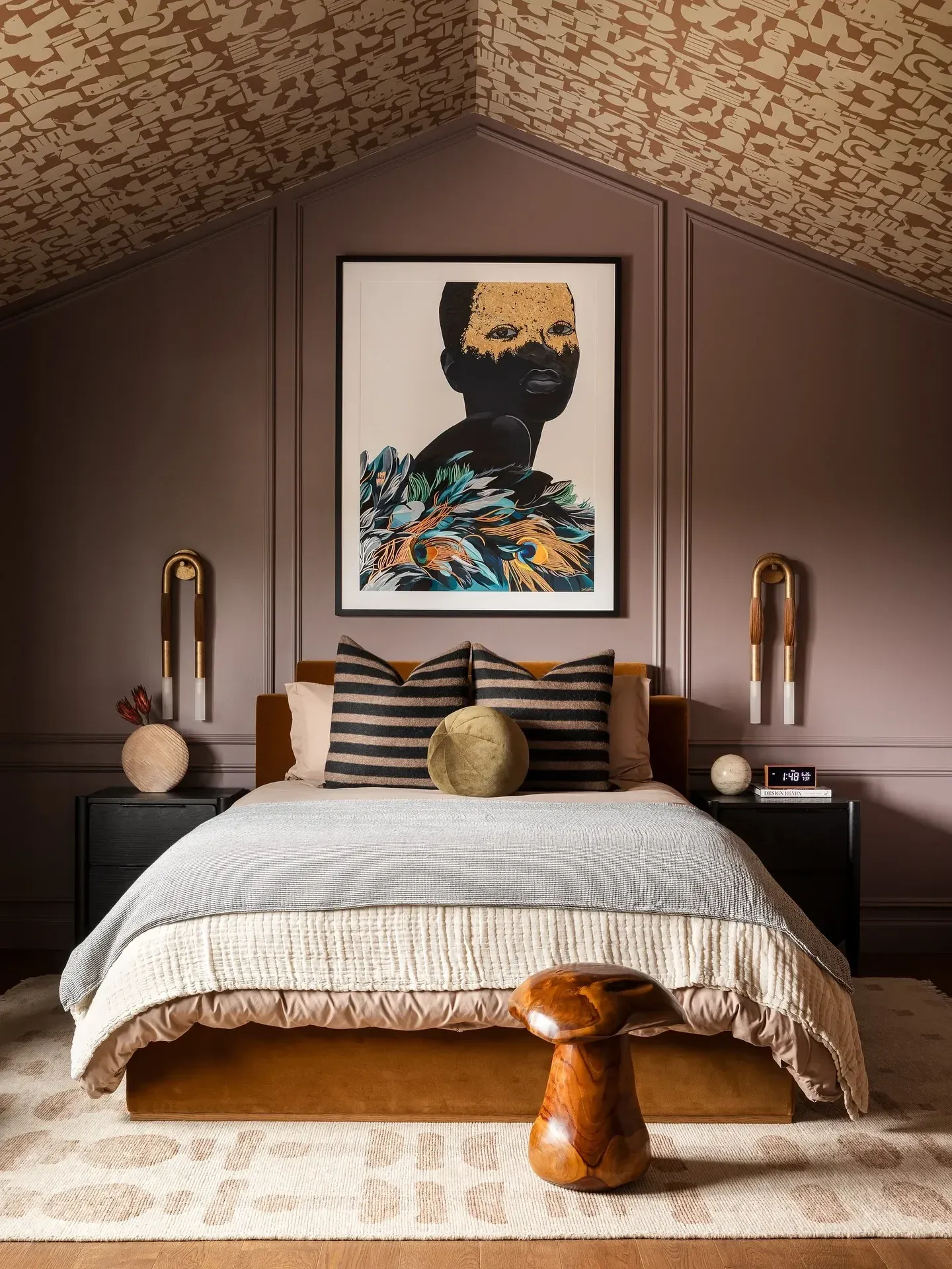 moody bedroom ideas with patterned wallpaper ceiling, mauve walls, striped bedding, and bold artwork