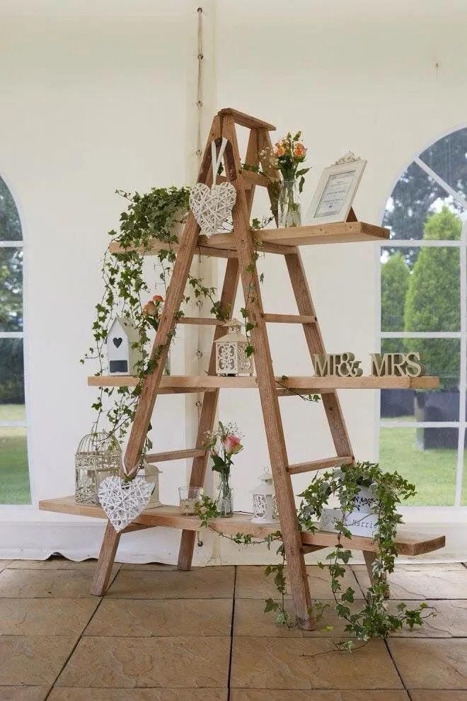wedding reception entrance table with pretty decor details