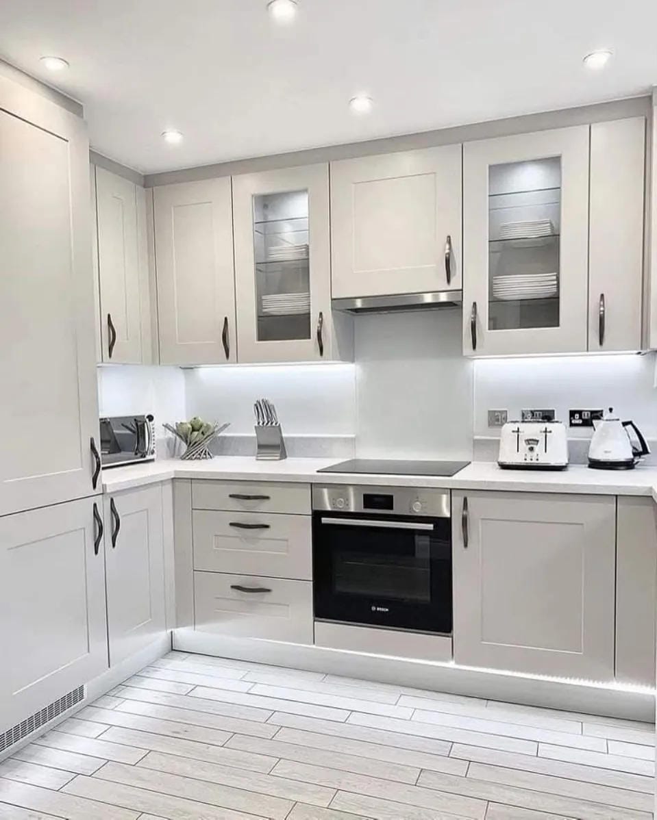 kitchen floors with white cabinets
