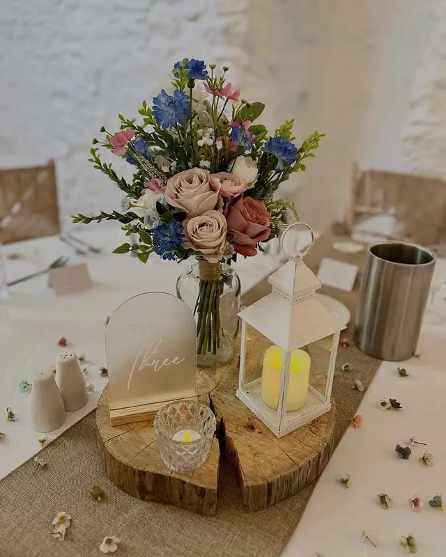 rustic wedding table centerpiece with lanterns