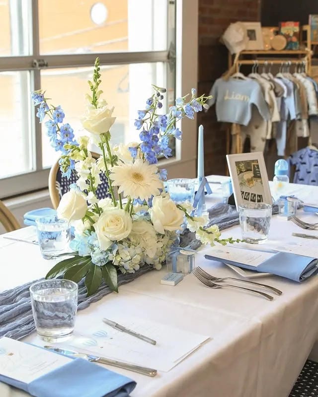 boy baby shower table flowers in blue and yellow